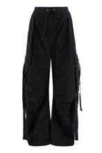 Load image into Gallery viewer, Cargo pants in coated faille