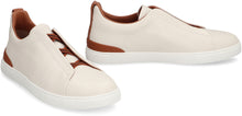 Load image into Gallery viewer, Triple Stitch slip-on sneakers
